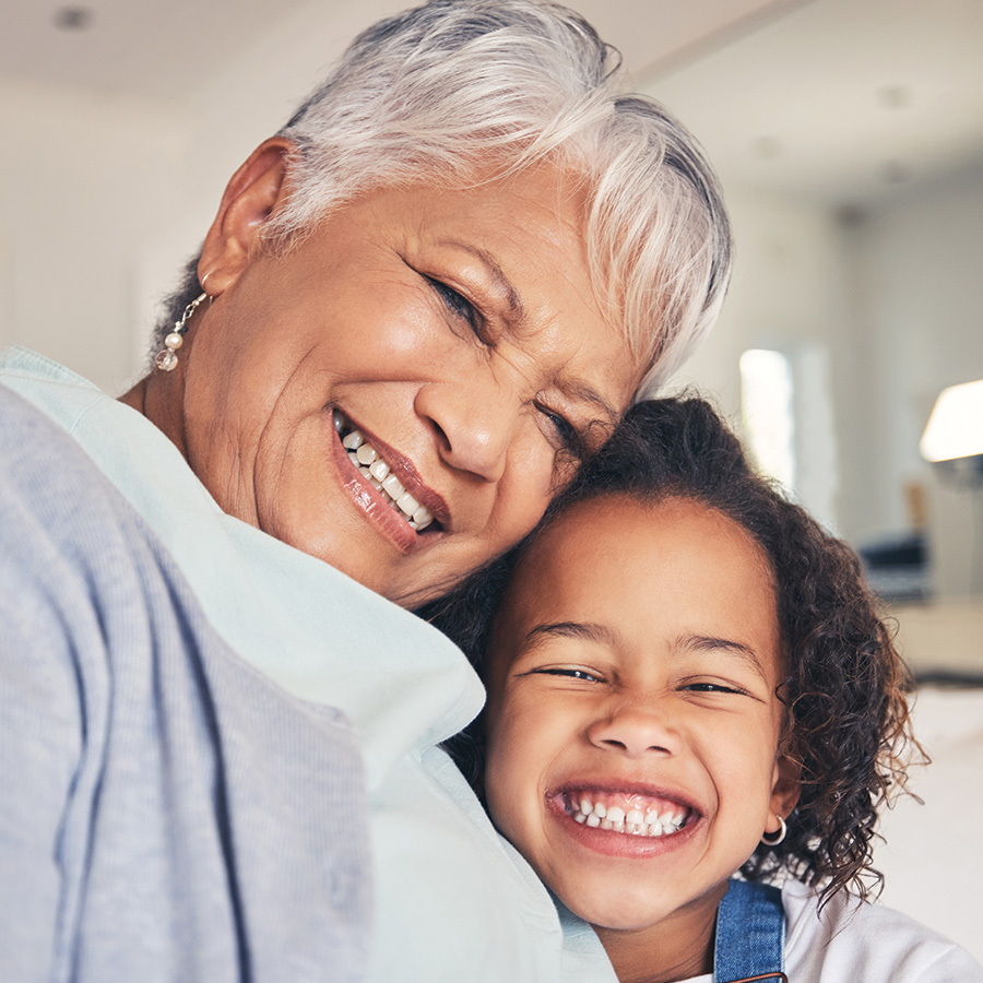 girl and woman share loving embrace big smiles 2026 01 09 11 30 39 utc