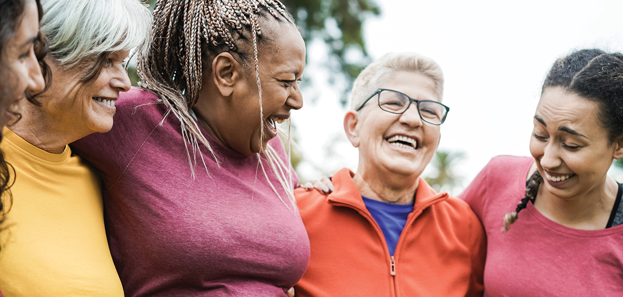 group of happy women embracing outdoors laughing t 2026 01 11 08 12 16 utc