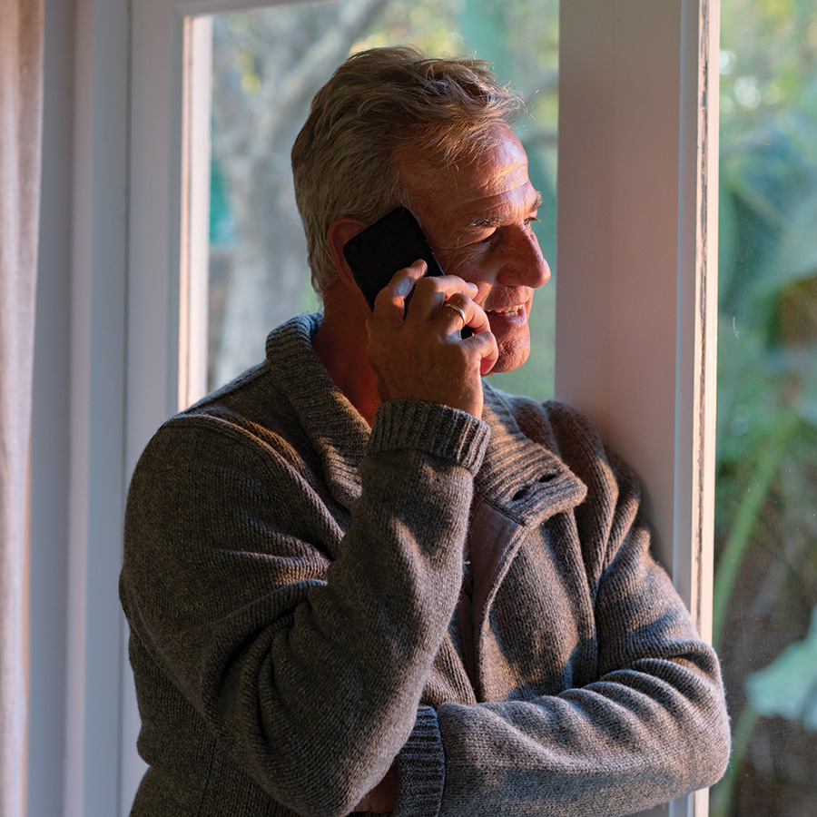 man chatting on mobile phone indoors 2026 03 25 00 59 00 utc