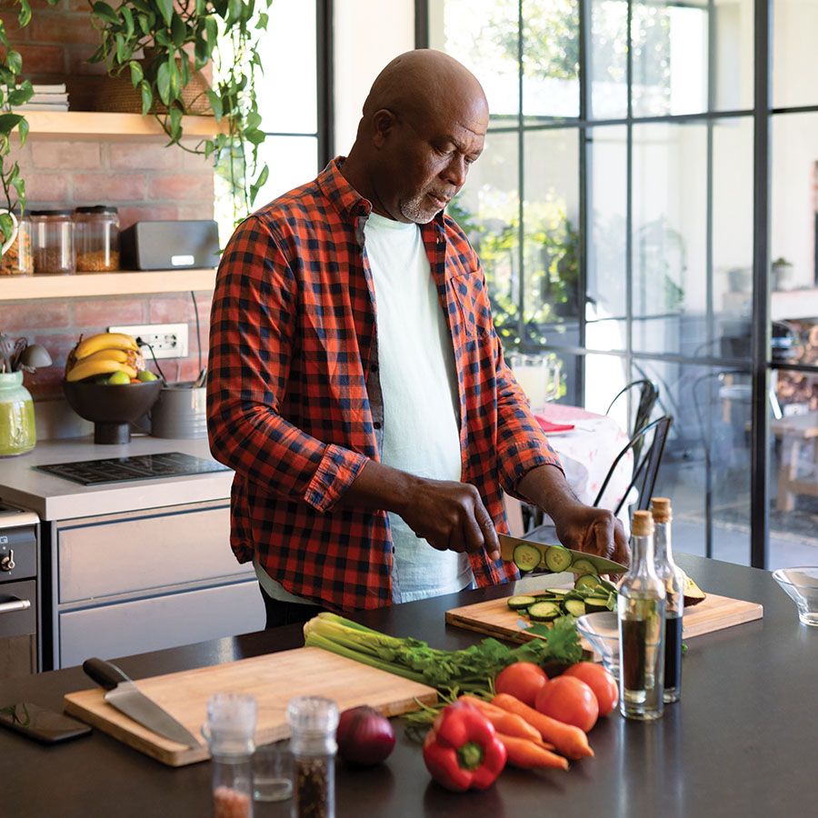 serious african american senior man cooking in kit 2022 01 19 00 02 57 utc