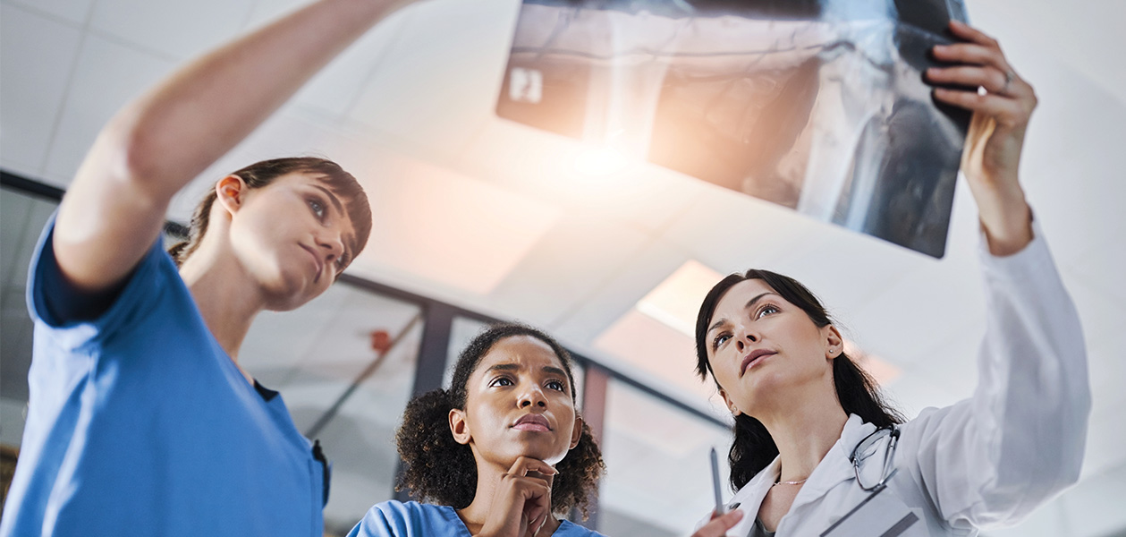 shot of a group of doctors discussing the results 2026 01 09 11 15 00 utc