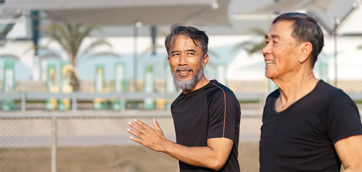 joyful senior asian men jogging together on a spor 2026 03 19 07 08 20 utc