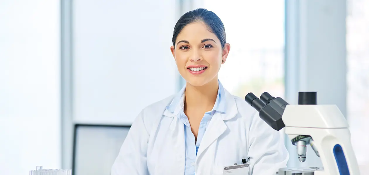 young woman scientist working with microscope 2026 03 25 08 26 37 utc