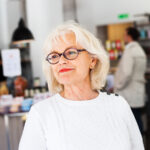 close up of senior woman smiling at restaurant 2026 03 09 22 30 49 utc